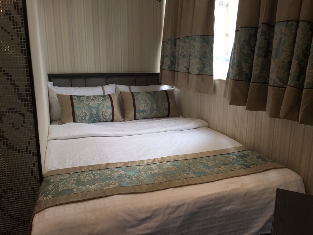 הונג קונג Seasons Hotel מראה חיצוני תמונה